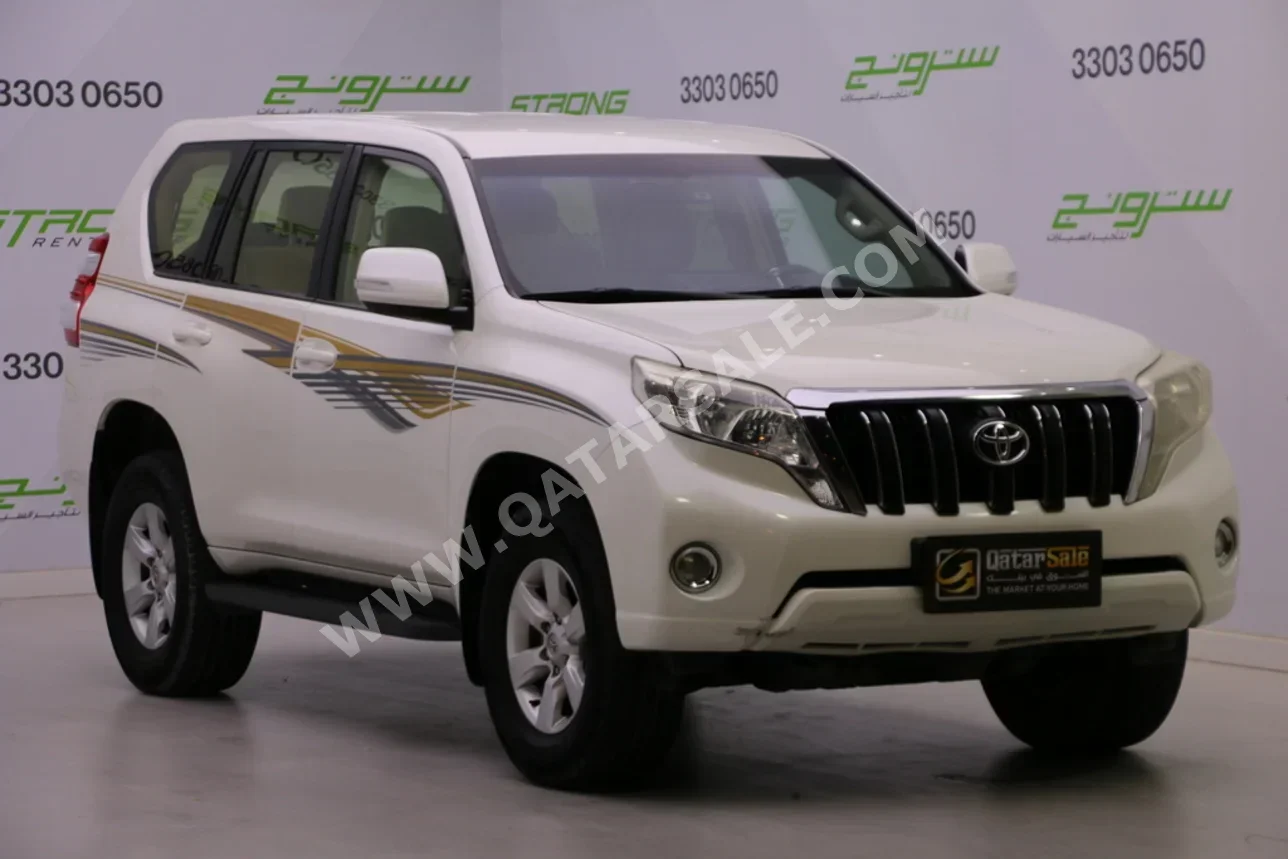 تويوتا برادو 2016 اوتوماتيك 180,000 كم 4 سلندر دفع رباعي اس يو في أبيض