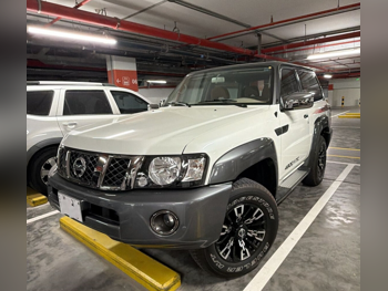 Nissan  Patrol  Super Safari  2024  Manual  23,000 Km  6 Cylinder  Four Wheel Drive (4WD)  SUV  Pearl  With Warranty