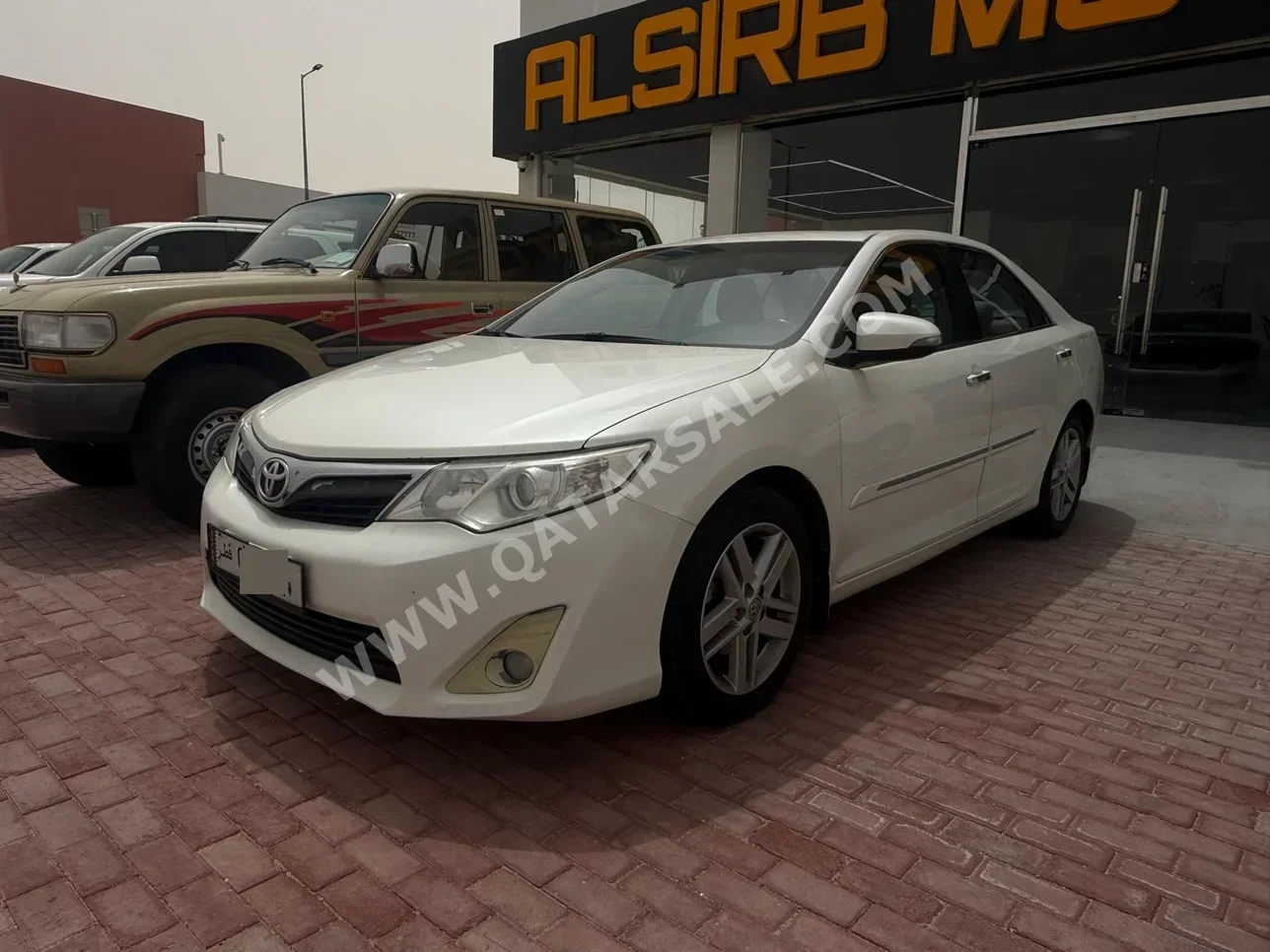 Toyota  Camry  GLX  2015  Automatic  332,000 Km  4 Cylinder  Front Wheel Drive (FWD)  Sedan  White
