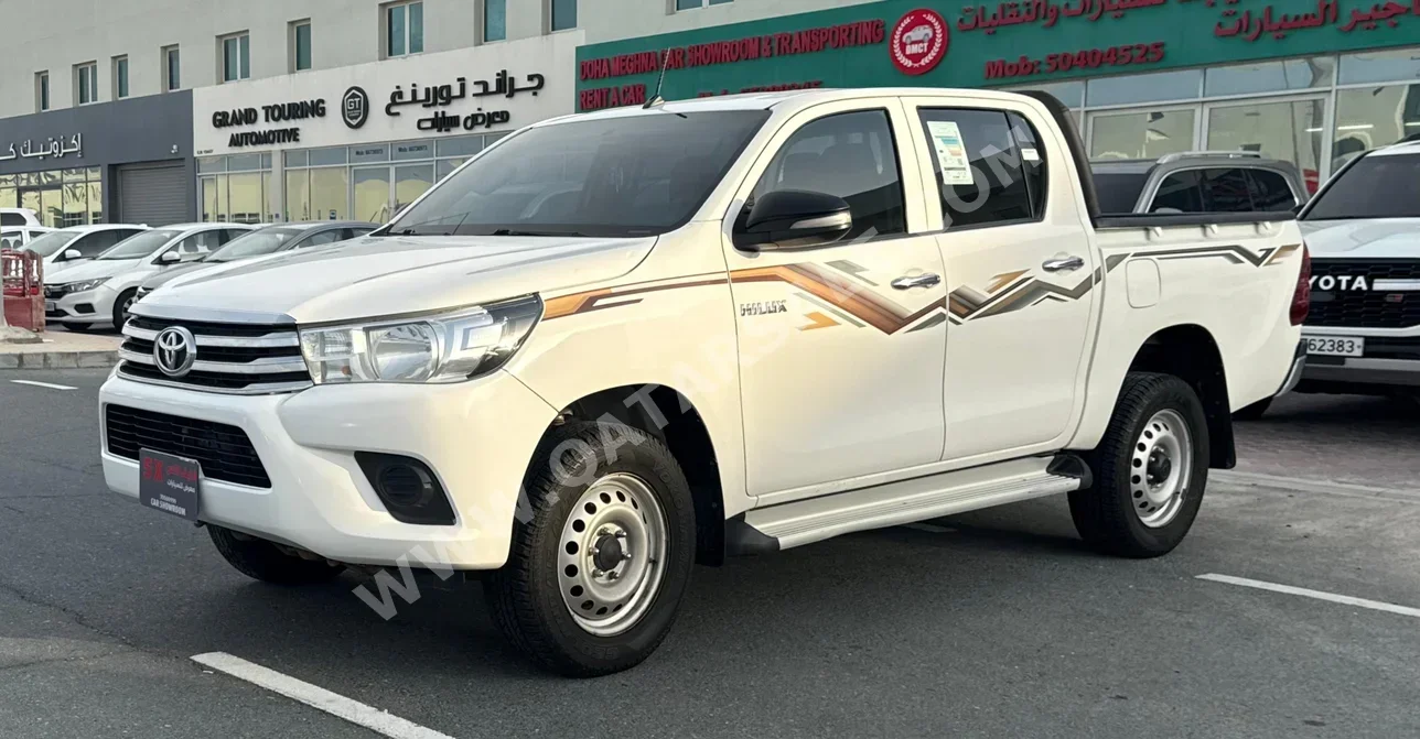 Toyota  Hilux  2024  Automatic  158,000 Km  4 Cylinder  Four Wheel Drive (4WD)  Pick Up  White  With Warranty