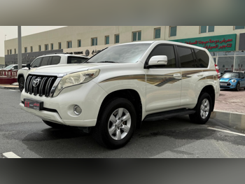 Toyota  Prado  TXL  2014  Automatic  240,000 Km  4 Cylinder  Four Wheel Drive (4WD)  SUV  White