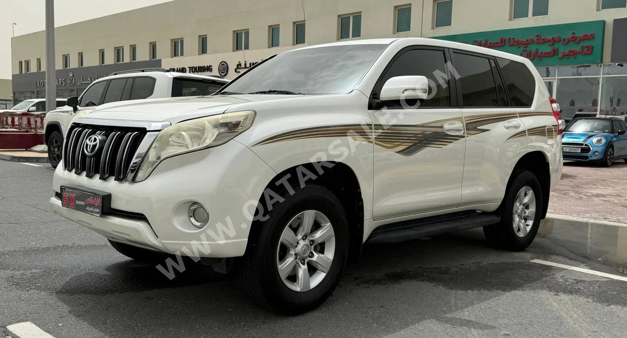 Toyota  Prado  TXL  2014  Automatic  240,000 Km  4 Cylinder  Four Wheel Drive (4WD)  SUV  White