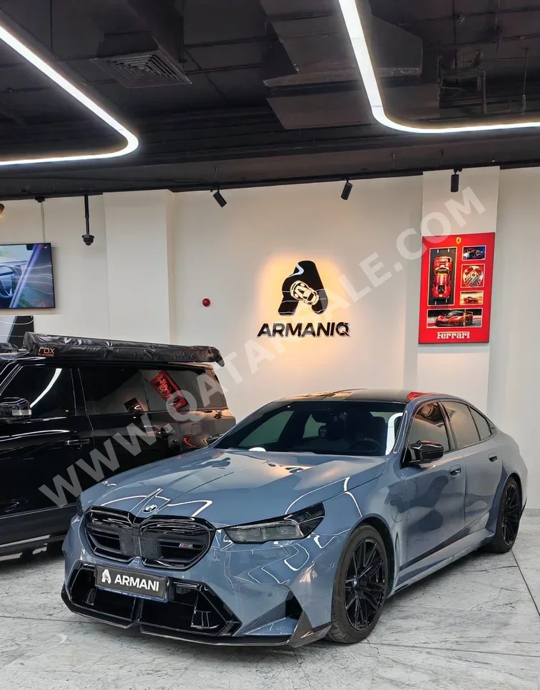 BMW  M-Series  5  2025  Automatic  6,700 Km  8 Cylinder  All Wheel Drive (AWD)  Sedan  Gray  With Warranty