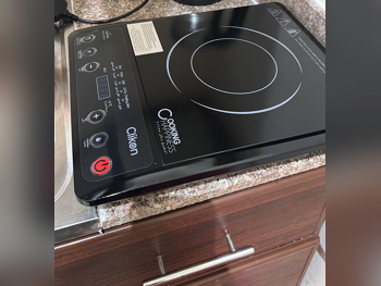 طبّاخ - كهرباء - أسود