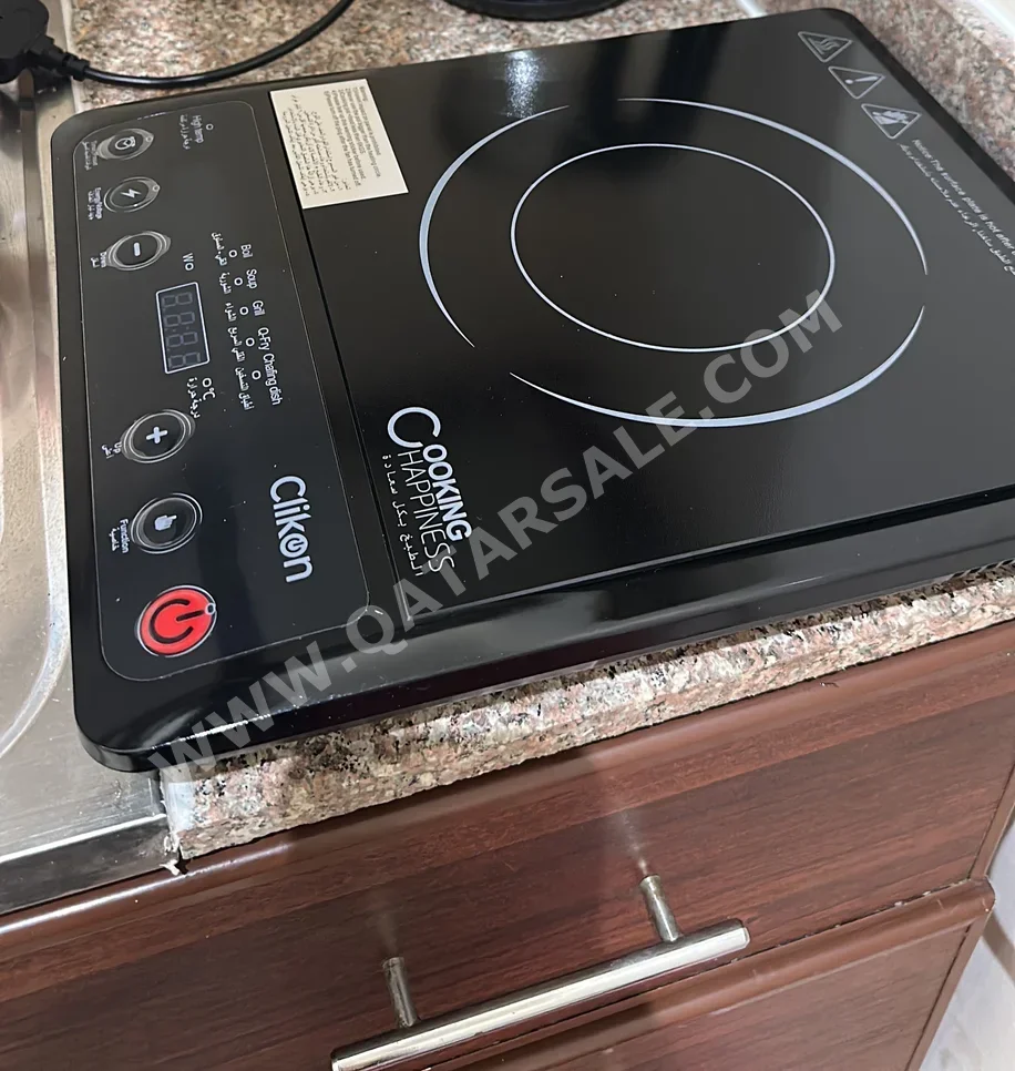 طبّاخ  - كهرباء  - أسود