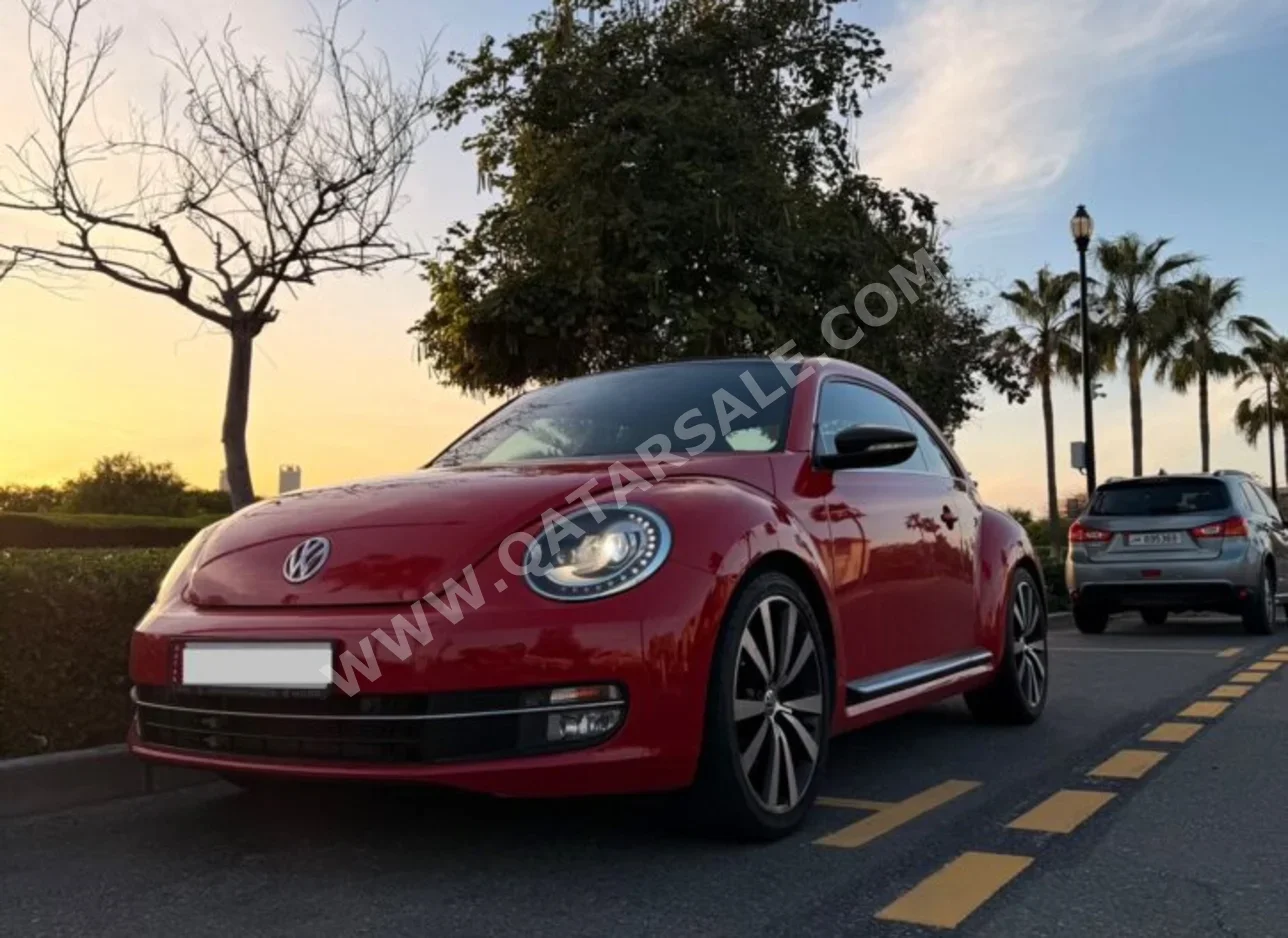 Volkswagen  Beetle  Turbo  2015  Automatic  100,000 Km  4 Cylinder  Front Wheel Drive (FWD)  Hatchback  Red