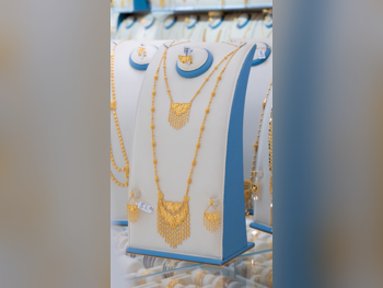 الذهب طقم البحرين نسائي حسب الوزن 70.53 غرام ضمان الصيانة توصيل مجاني ذهب أصفر عيار 21