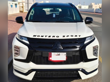 Mitsubishi  Pajero  Montero Sport  2023  Automatic  25,800 Km  6 Cylinder  Four Wheel Drive (4WD)  SUV  White  With Warranty