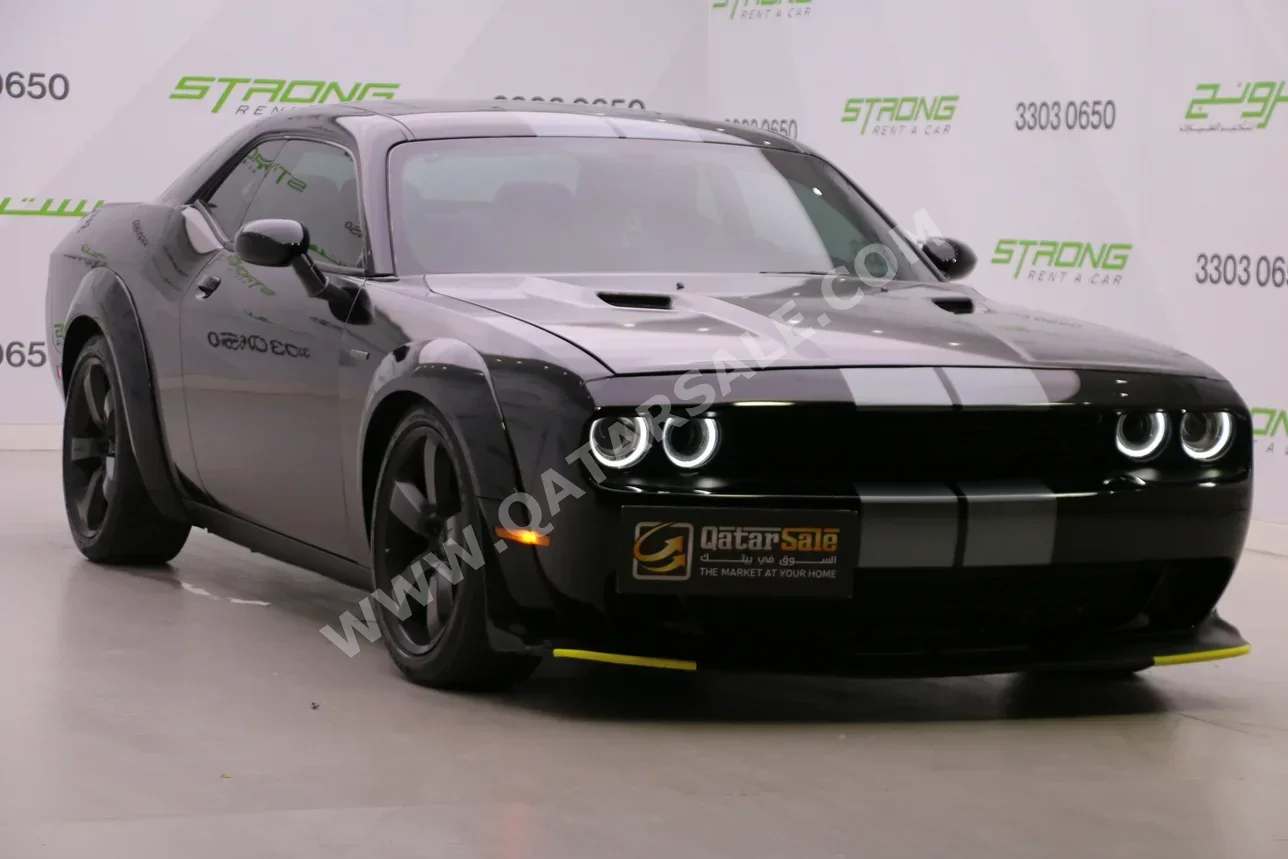 Dodge  Challenger  2013  Automatic  89,000 Km  8 Cylinder  Rear Wheel Drive (RWD)  Coupe / Sport  Black