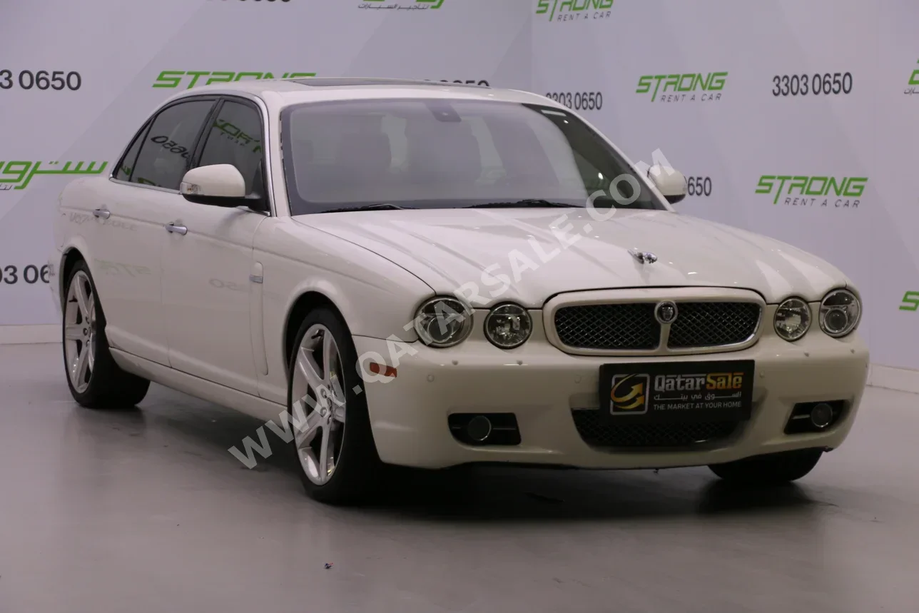 Jaguar  XJ  2009  Automatic  254,366 Km  6 Cylinder  Rear Wheel Drive (RWD)  Sedan  White