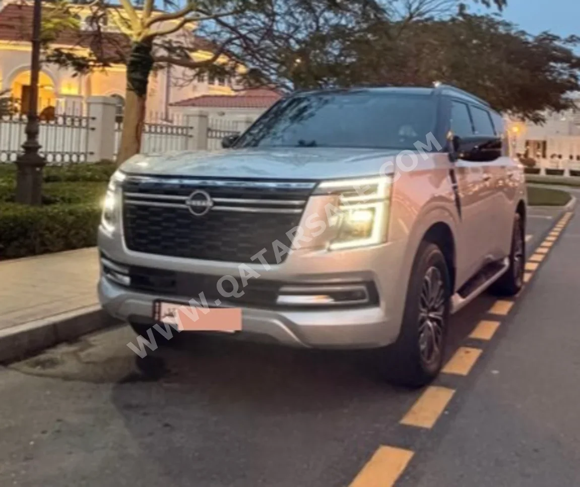 Nissan  Patrol  Platinum  2025  Automatic  14,000 Km  6 Cylinder  Four Wheel Drive (4WD)  SUV  Silver and Black  With Warranty
