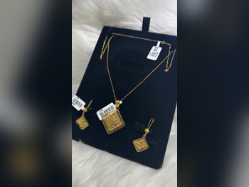 الذهب طقم البحرين نسائي حسب القطعة ( ديزاينرز) بدون حجر ضمان الصيانة توصيل مجاني ذهب أصفر عيار 21