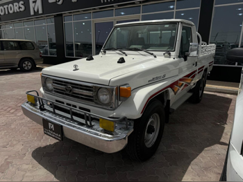 تويوتا  لاند كروزر  ال اكس  1996  عادي  150,000 كم  6 سلندر  دفع رباعي  بيكب  أبيض