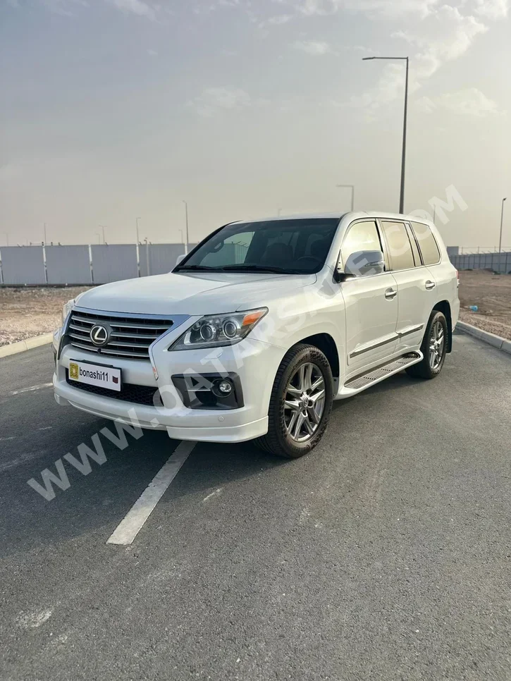 Lexus  LX  570 S  2014  Automatic  265,218 Km  8 Cylinder  Four Wheel Drive (4WD)  SUV  White