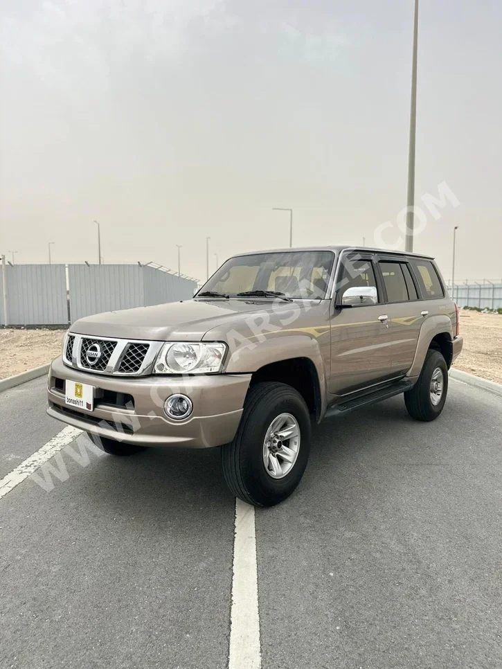 Nissan  Patrol  Super Safari  2009  Manual  208,146 Km  6 Cylinder  Four Wheel Drive (4WD)  SUV  Gold