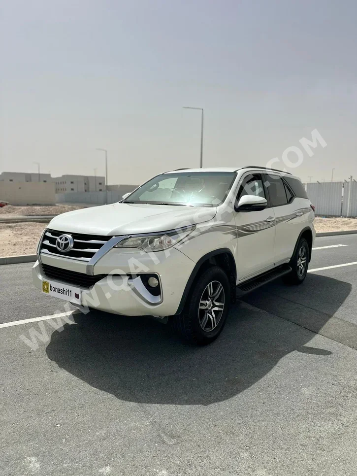 Toyota  Fortuner  2018  Automatic  235,233 Km  4 Cylinder  Four Wheel Drive (4WD)  SUV  White