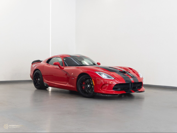 دودج  فايبر  جي تي اس  2014  عادي  43,350 كم  10 سلندر  دفع خلفي  كوبيه \ سبورت  أحمر