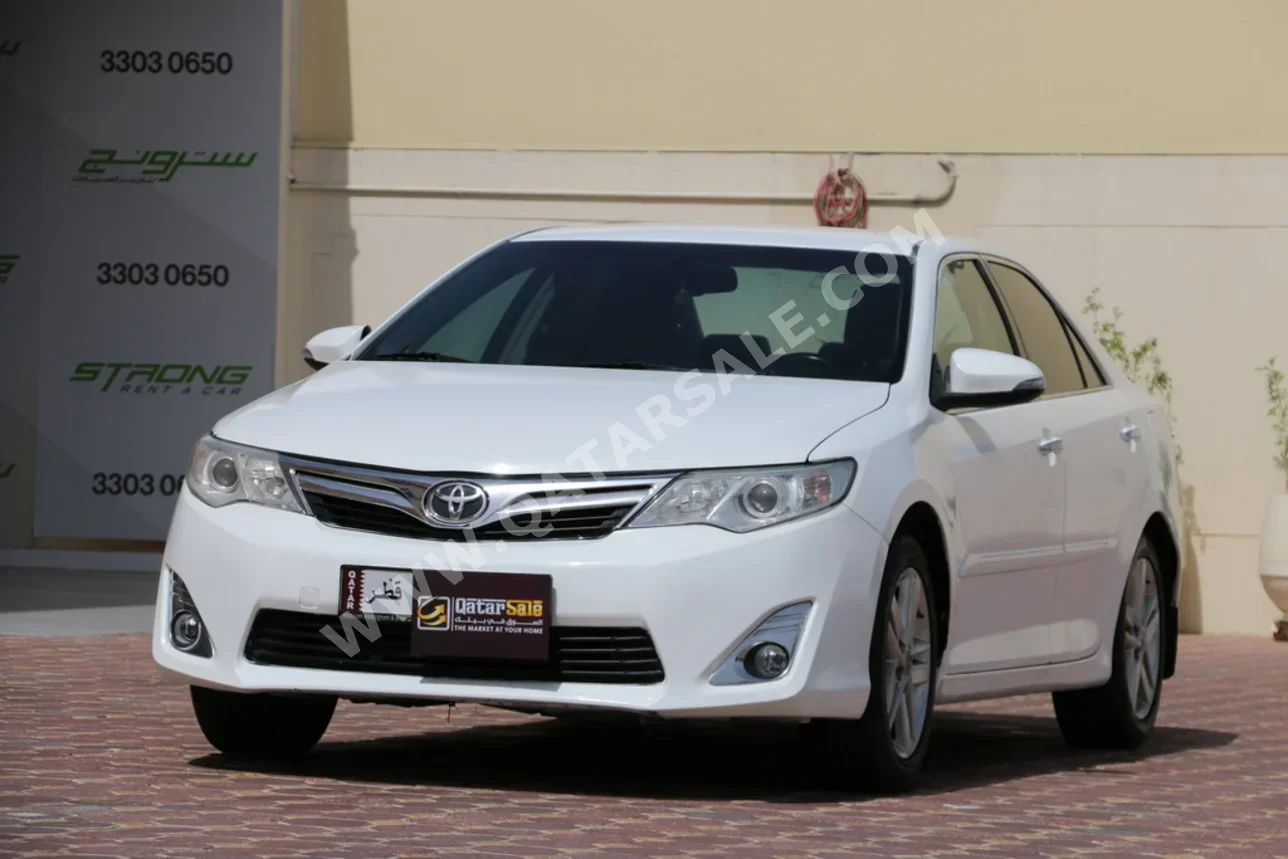 Toyota  Camry  2015  Automatic  259,000 Km  4 Cylinder  Front Wheel Drive (FWD)  Sedan  Pearl