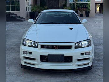 Nissan  Skyline  R34 GT-R  2001  Manual  140,000 Km  6 Cylinder  Four Wheel Drive (4WD)  Coupe / Sport  White