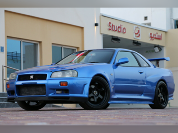 Nissan  Skyline  R34 GT-R  1998  Manual  145,000 Km  6 Cylinder  Rear Wheel Drive (RWD)  Coupe / Sport  Blue