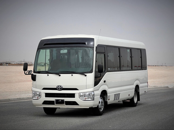 Toyota  Coaster  2022  Manual  140,000 Km  4 Cylinder  Rear Wheel Drive (RWD)  Van / Bus  White