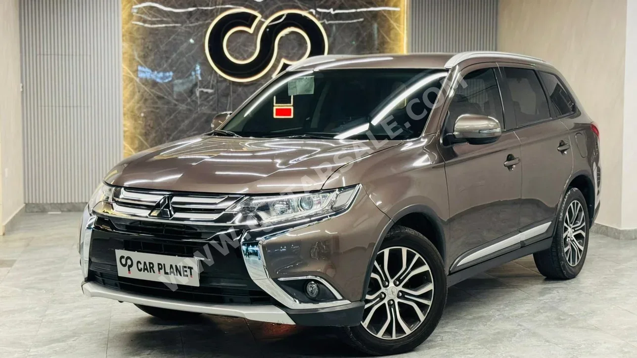 ميتسوبيشي  أوت لاندر  2018  اوتوماتيك  90,000 كم  4 سلندر  دفع رباعي  اس يو في  فضي دخاني