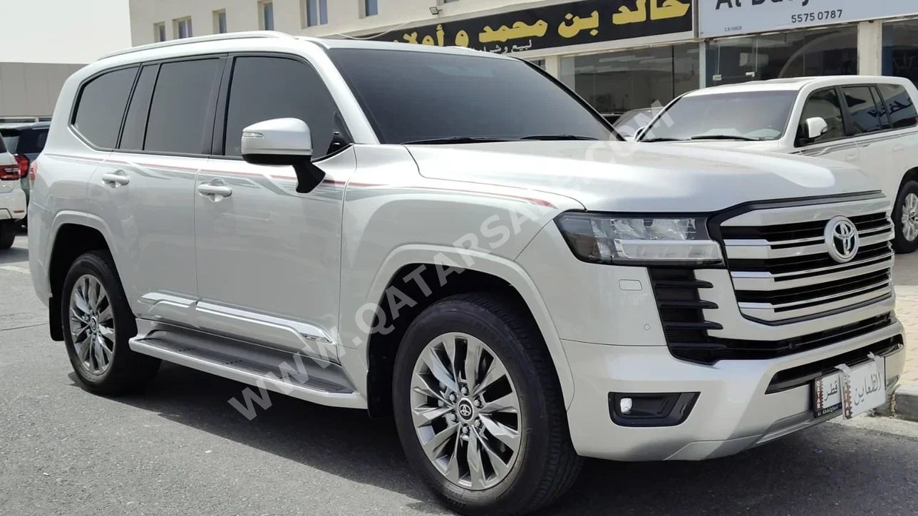 Toyota  Land Cruiser  GXR Twin Turbo  2024  Automatic  27,000 Km  6 Cylinder  Four Wheel Drive (4WD)  SUV  Silver  With Warranty