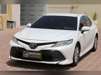 Toyota  Camry  LE  2019  Automatic  260,000 Km  4 Cylinder  Front Wheel Drive (FWD)  Sedan  White