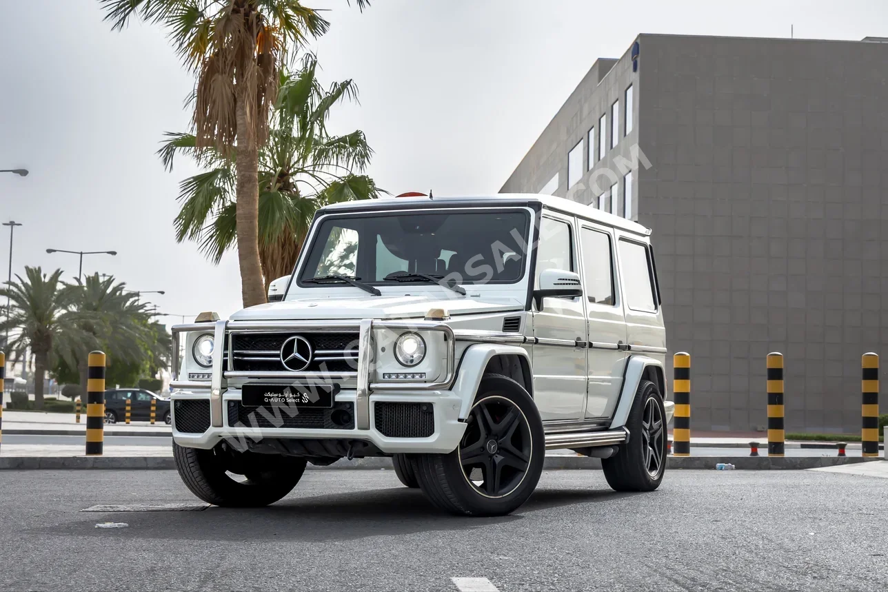 مرسيدس - بنز  جي - كلاس  63 اي ام جي  2014  اوتوماتيك  147,000 كم  8 سلندر  دفع رباعي  اس يو في  أبيض