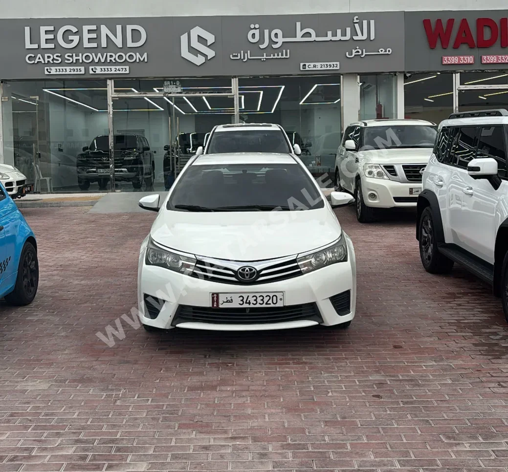 Toyota  Corolla  2015  Automatic  160,000 Km  4 Cylinder  Front Wheel Drive (FWD)  Sedan  White