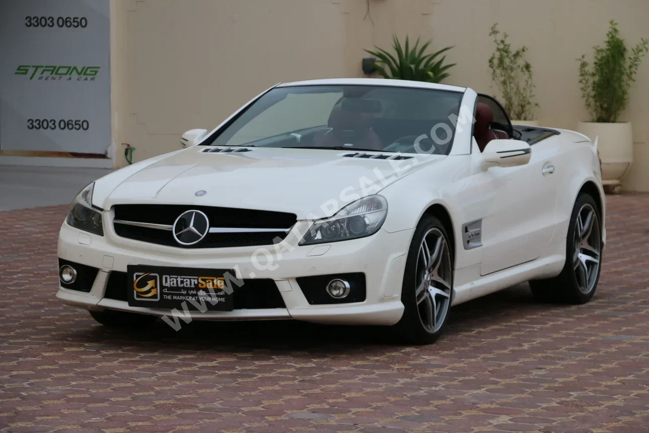 مرسيدس - بنز  اس ال  63 AMG  2009  اوتوماتيك  79,000 كم  8 سلندر  دفع خلفي  كشف  أبيض