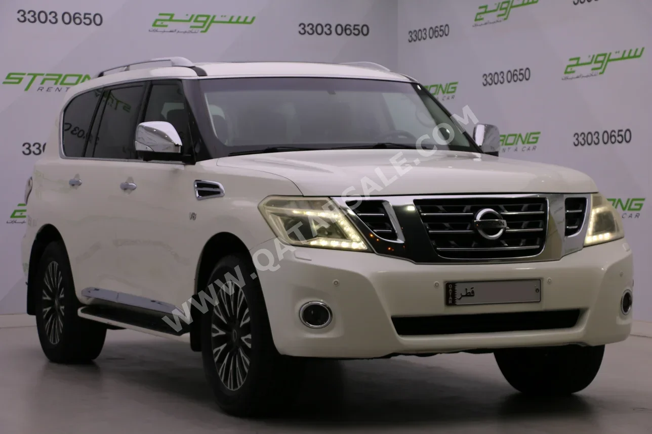Nissan  Patrol  Platinum  2014  Automatic  250,000 Km  8 Cylinder  Four Wheel Drive (4WD)  SUV  White