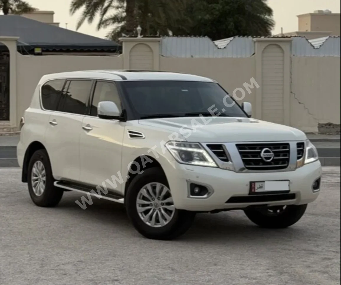 نيسان  باترول  اس اي  2017  اوتوماتيك  230,000 كم  6 سلندر  دفع رباعي  اس يو في  أبيض