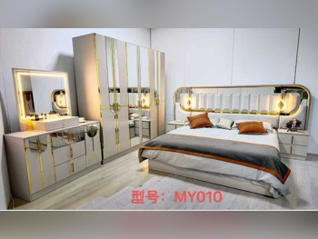 أطقم غرف نوم - قطر ديزاين  - طقم مكون من 4 قطع  - متعدد الألوان