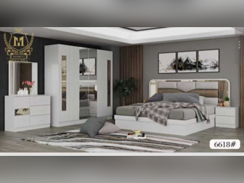 أطقم غرف نوم - قطر ديزاين  - طقم مكون من 4 قطع  - متعدد الألوان