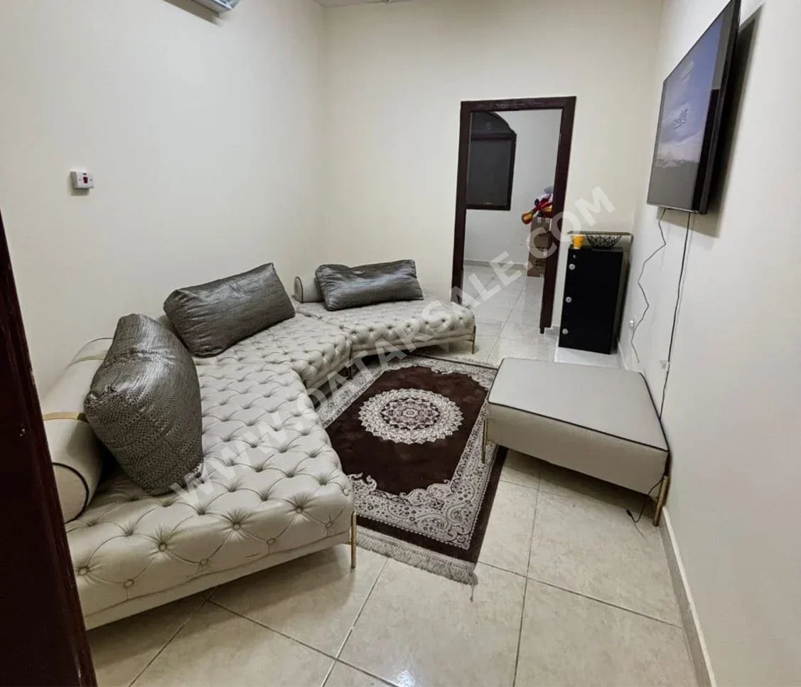 الأرائك والكنب والكراسي هوم سينتر  شكل L  - جلد صناعي  - اللون البيج