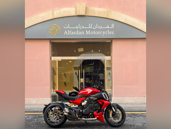 دوكاتي  ديافيل في4 -  2024 - اللون احمر -  الضمان