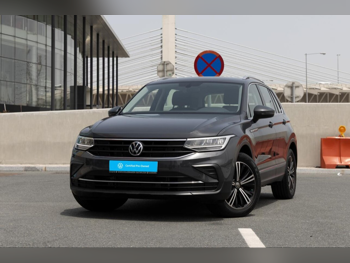 Volkswagen  Tiguan  1.4 TSI  2023  Automatic  9,700 Km  4 Cylinder  Front Wheel Drive (FWD)  SUV  Gray  With Warranty