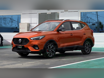 ام جي  زد اس  2025  اوتوماتيك  0 كم  4 سلندر  سحب امامي  اس يو في  برتقالي