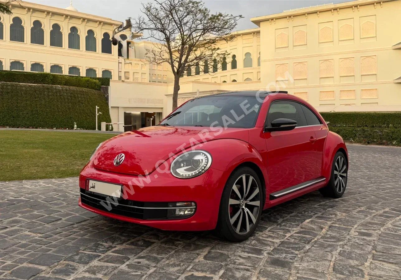 فوكس واغن  بيتل  توربو  2015  اوتوماتيك  98,000 كم  4 سلندر  سحب امامي  هاتشباك  أحمر