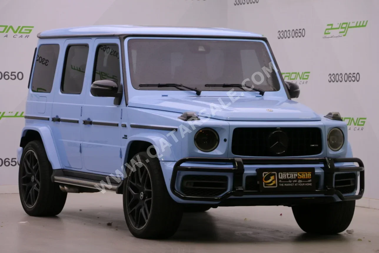 مرسيدس - بنز  جي - كلاس  63 اي ام جي  2019  اوتوماتيك  97,000 كم  8 سلندر  دفع رباعي  اس يو في  سمائي