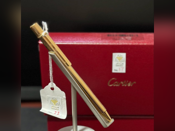 قلم كارتير  ذهبي فاتح -  سنة 2024