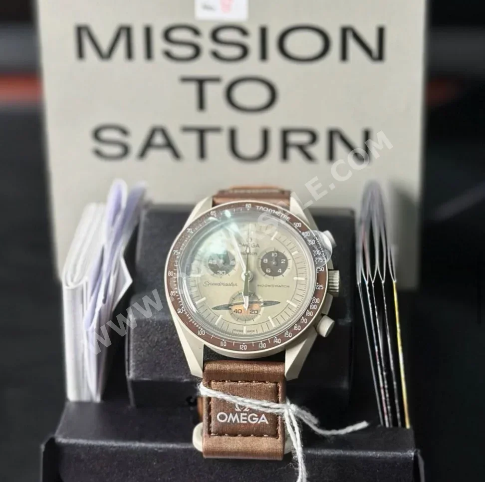 ساعات - أوميغا  - متعدد ميكانيكية/ رقمية  - بنى  - ساعات للجنسين