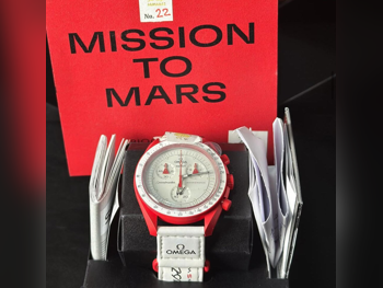 ساعات - أوميغا  - متعدد ميكانيكية/ رقمية  - أحمر  - ساعات للجنسين