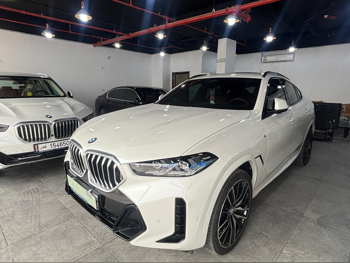 BMW  X-Series  X6 40i  2024  Automatic  14,000 Km  6 Cylinder  Four Wheel Drive (4WD)  SUV  White  With Warranty