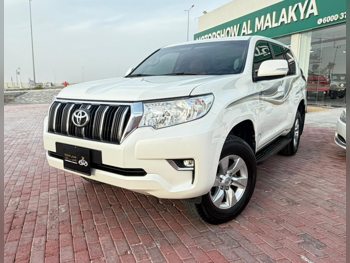تويوتا  برادو  تي اكس ال  2022  اوتوماتيك  200,000 كم  4 سلندر  دفع رباعي  اس يو في  أبيض