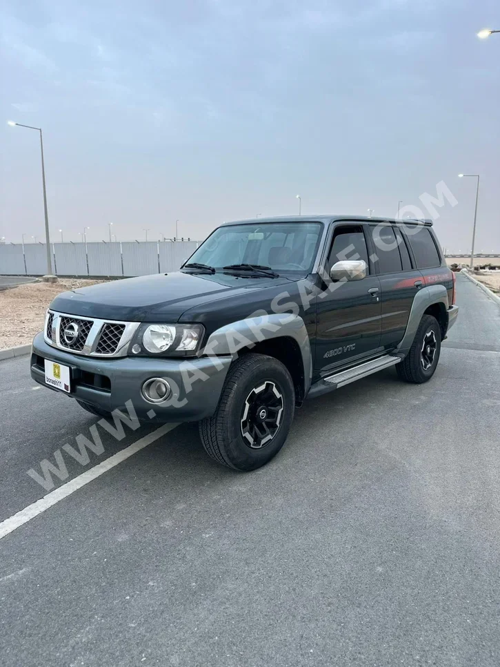 Nissan  Patrol  Super Safari  2021  Automatic  130,535 Km  6 Cylinder  Four Wheel Drive (4WD)  SUV  Black
