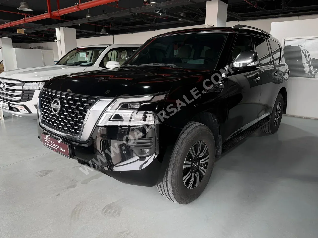 Nissan  Patrol  SE  2023  Automatic  56,000 Km  8 Cylinder  Four Wheel Drive (4WD)  SUV  Black  With Warranty