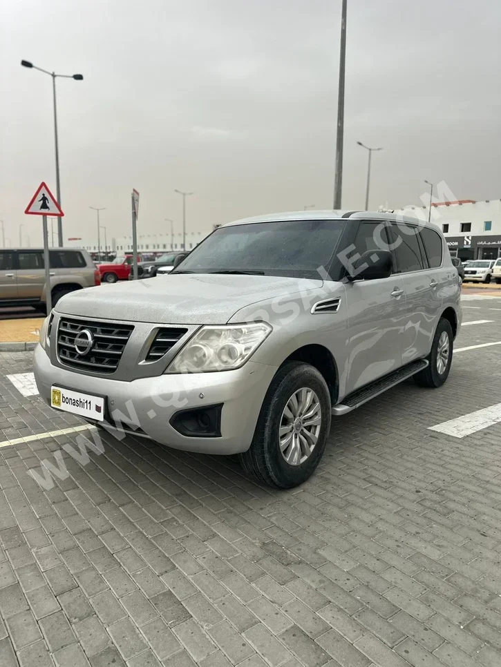Nissan  Patrol  XE  2017  Automatic  405,172 Km  6 Cylinder  Four Wheel Drive (4WD)  SUV  Silver
