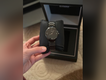 ساعات - رادو  - ساعات ميكانيكية  - أسود  - ساعات رجالي